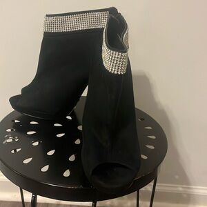 Black suede peep toe heel with rhinestone top. Worn twice.